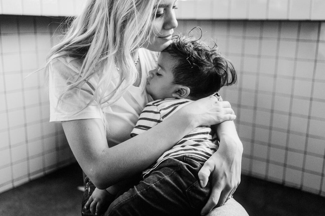 mother and child hugging after rescue