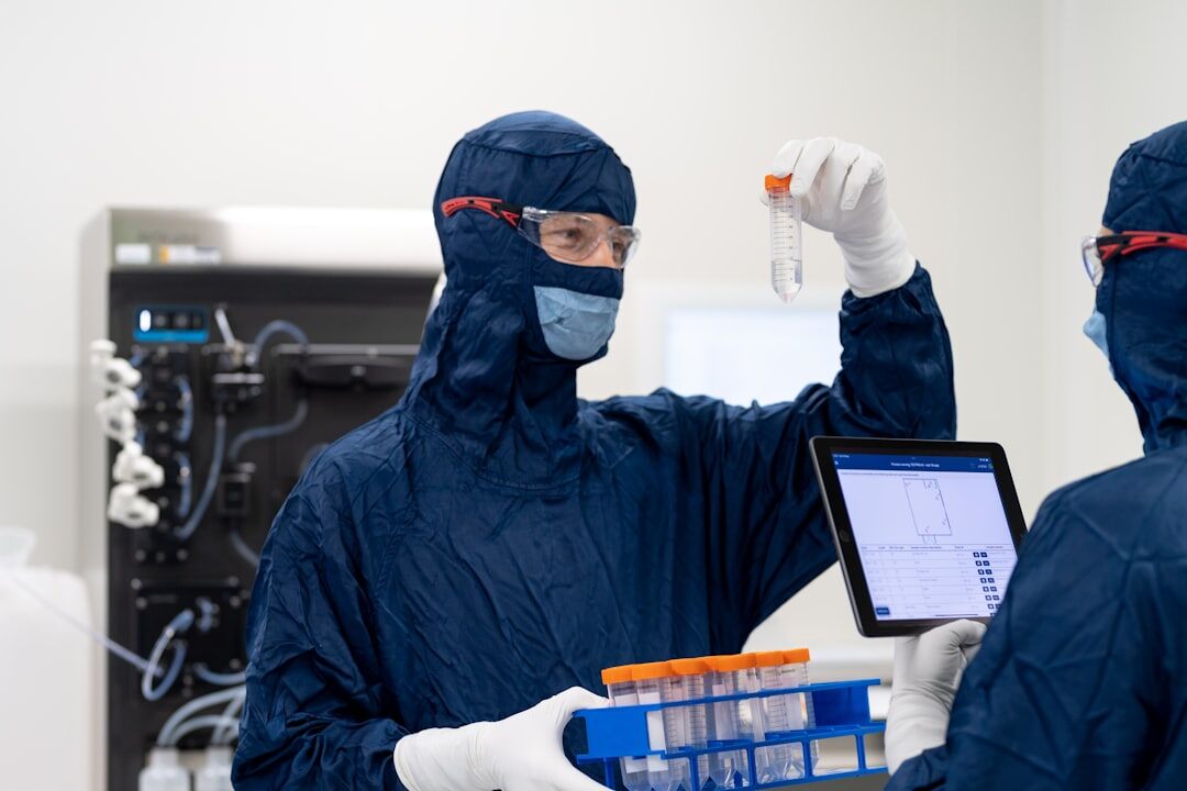 scientists examining test tubes