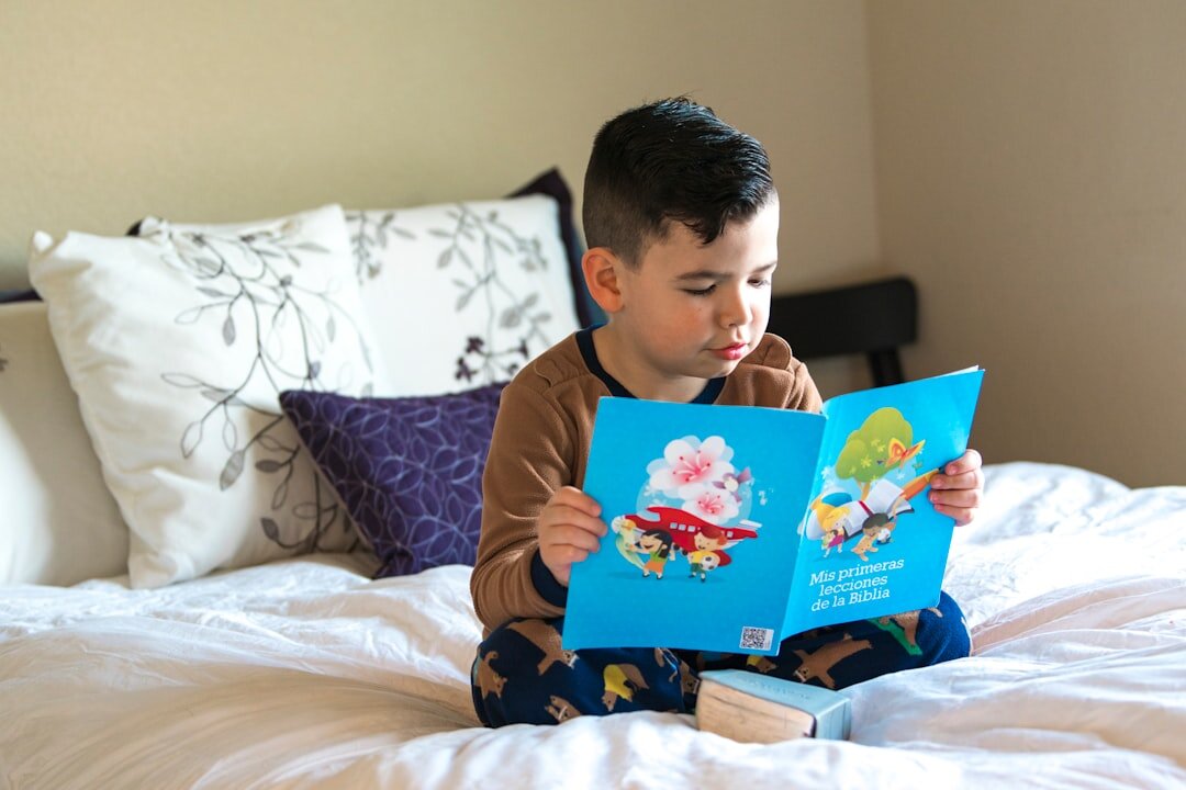 child studying with book